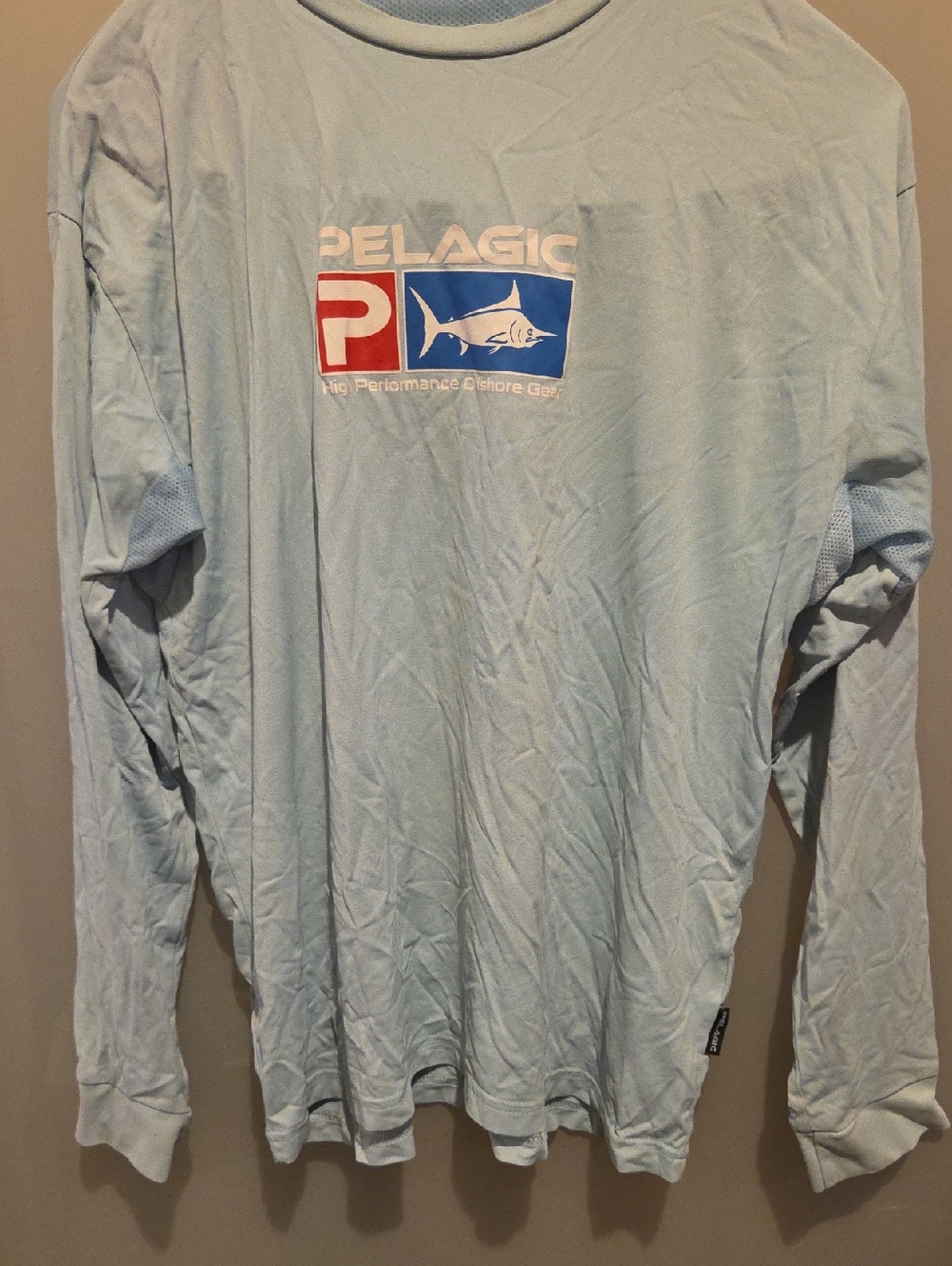 Pelagic Light Blue Long Sleeve Performance Shirt with Logo
